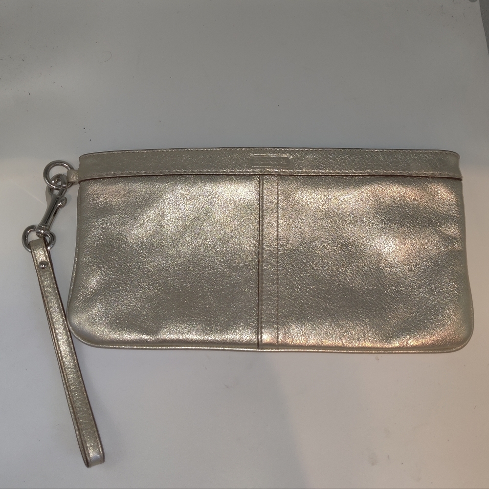 Coach Gold metallic leather wristlet.